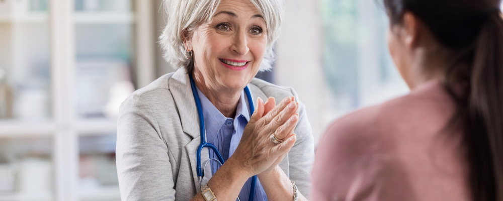 Female physician with female product manager